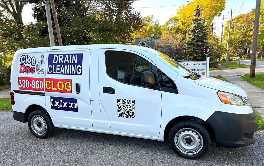 Clog Doc van with 330-960-CLOG on the side